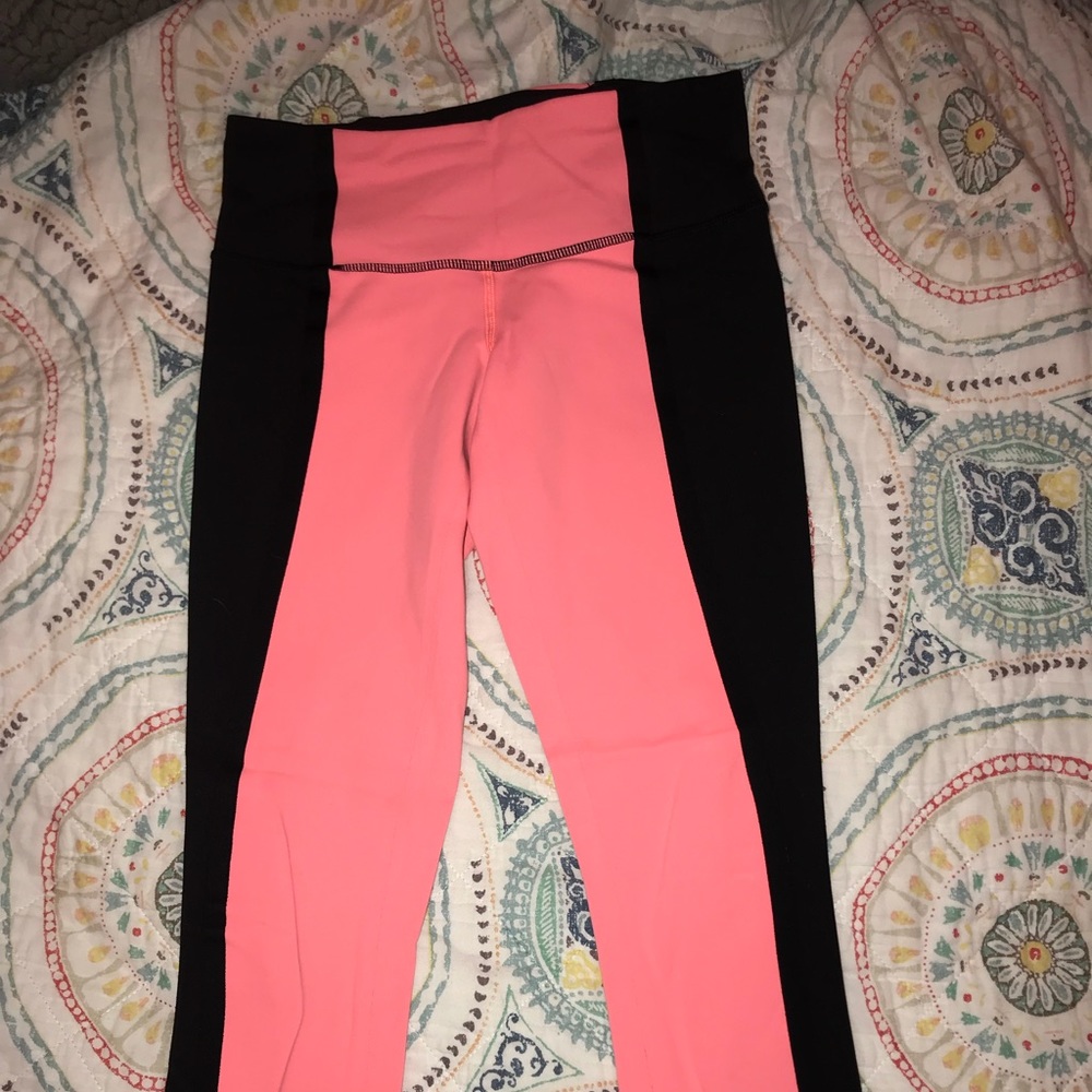 Lululemon half orange half black cropped leggings